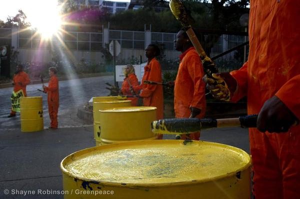 Greenpeace activists blocking the gate leading to the venue of secret nuclear energy discussions at the IDC in Sandton